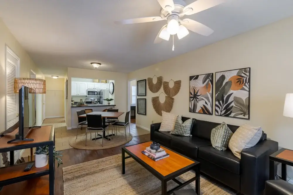 spacious living room and kitchen the vine at bermuda run apartments near gsu